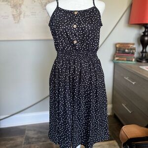 Black dress with white polka dots